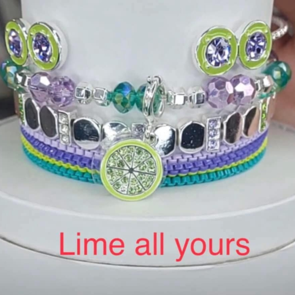 Silver and Green Multi-Strand Bracelet with Charms